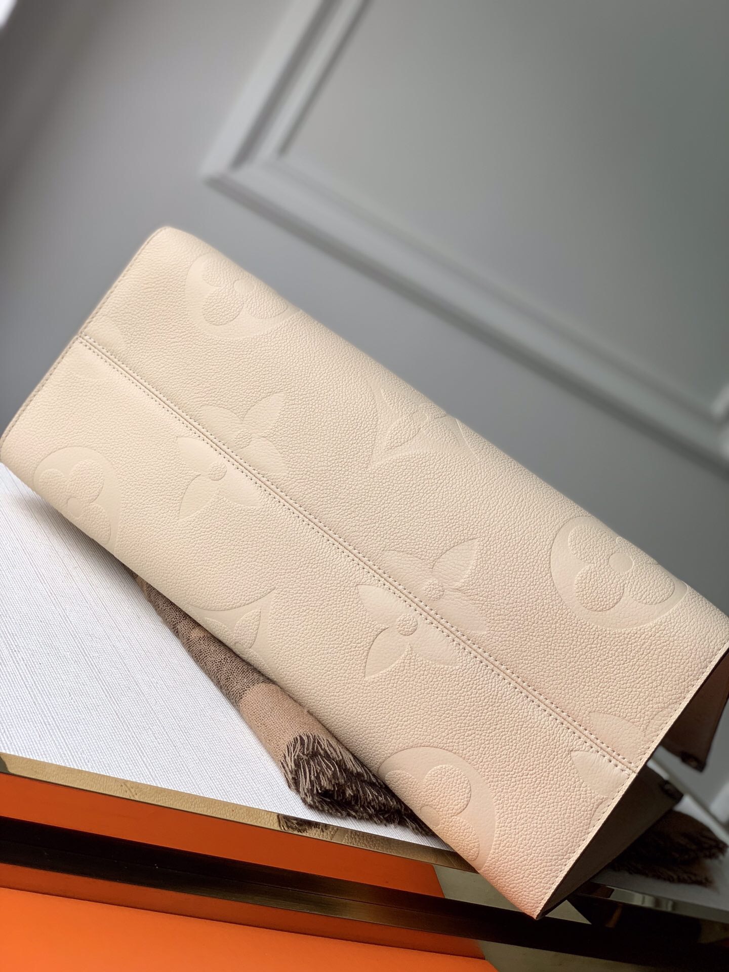 L0u1s Vu1tton Onthego Empreinte MM Turtledove in Leather with Gold-tone