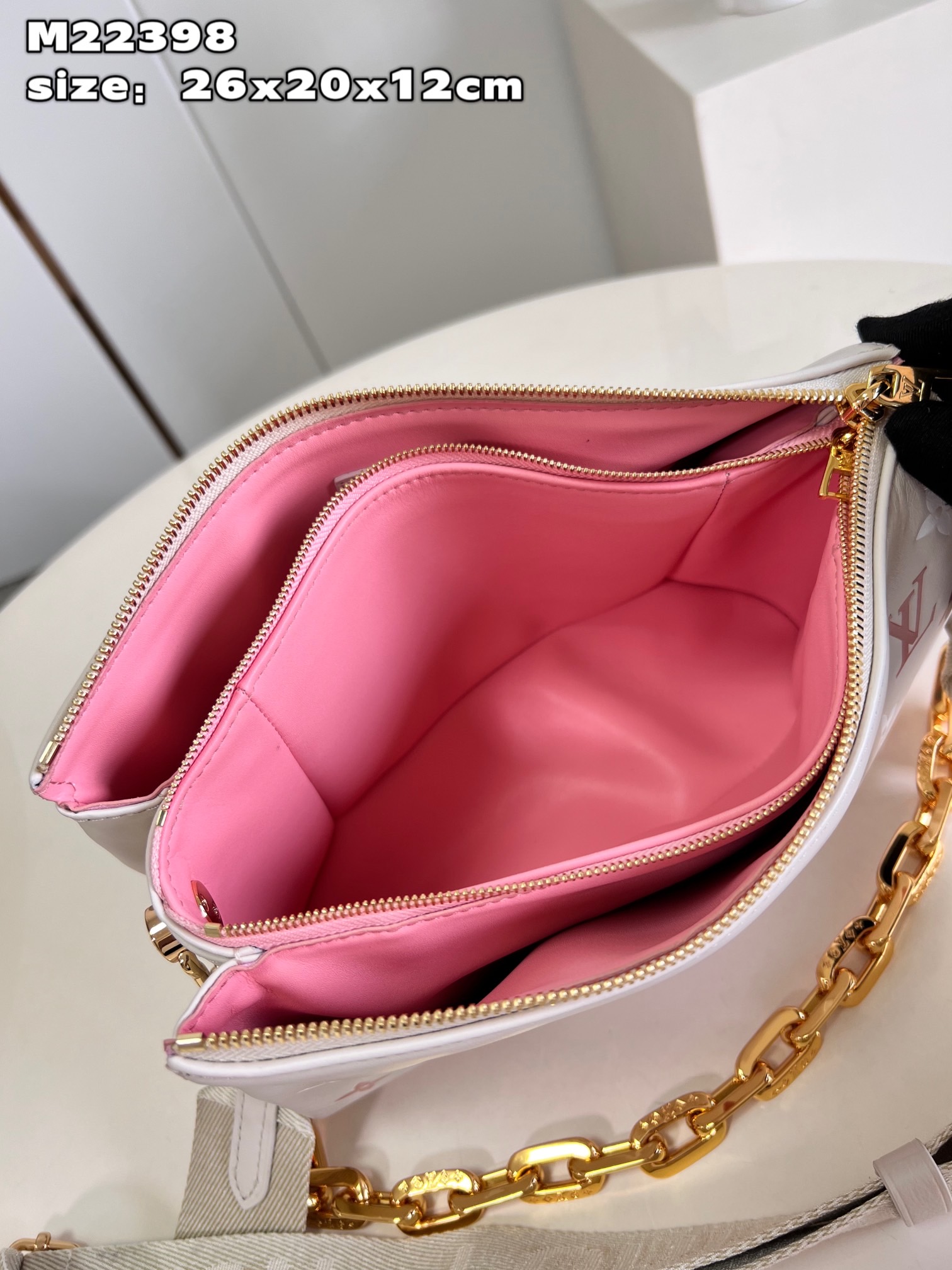 1V Coussin PM handbag M22398 26x20x12cm