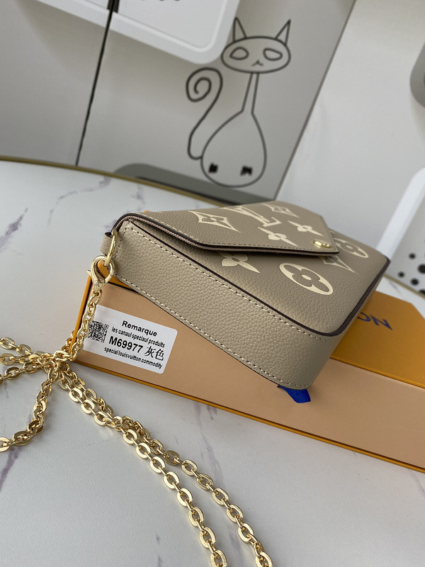 1V Pochette M69877 21CM