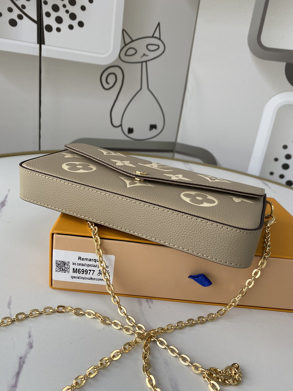 1V Pochette M69877 21CM