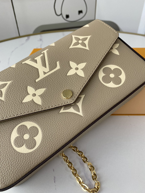 1V Pochette M69877 21CM