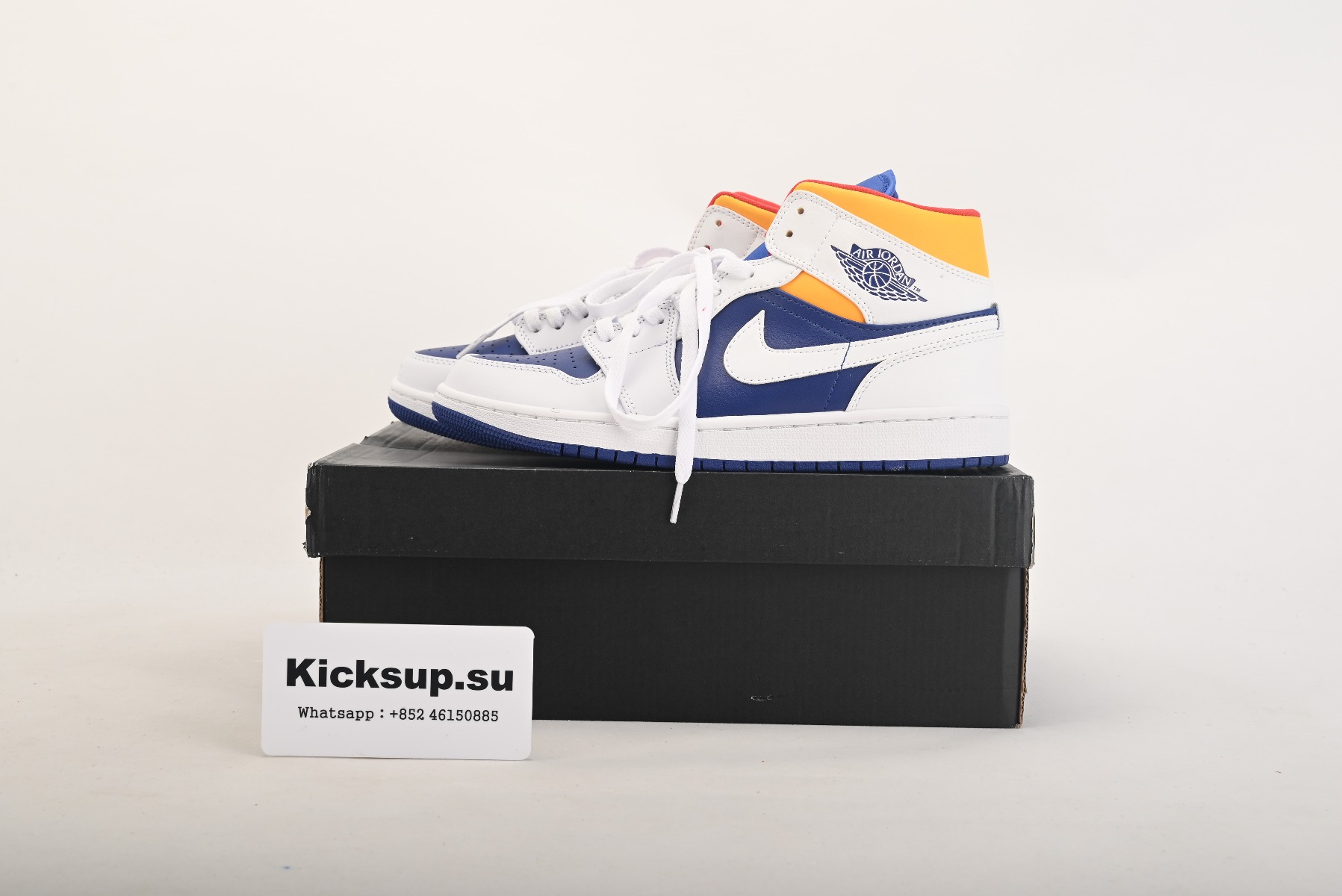Jordan 1 Mid Royal Blue Laser Orange 554724-131