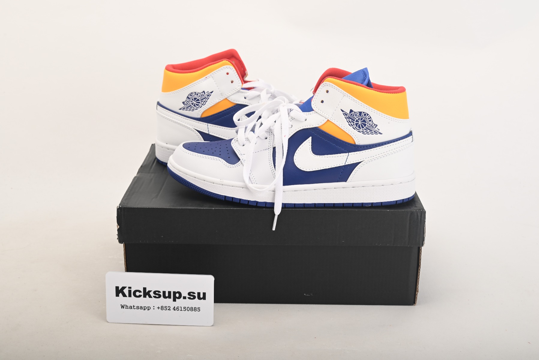 Jordan 1 Mid Royal Blue Laser Orange 554724-131